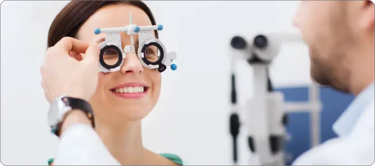 Digital marketing case study banner for Abate Al Salama Eye Hospital, showing a woman undergoing an eye examination with phoropter, reflecting significant growth in global patient engagement and search visibility.